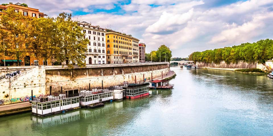 Boats on Tiber river in Rome
