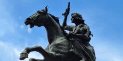 Anita Garibaldi monument with a pistol and her infant son on Janiculum Hill in Rome