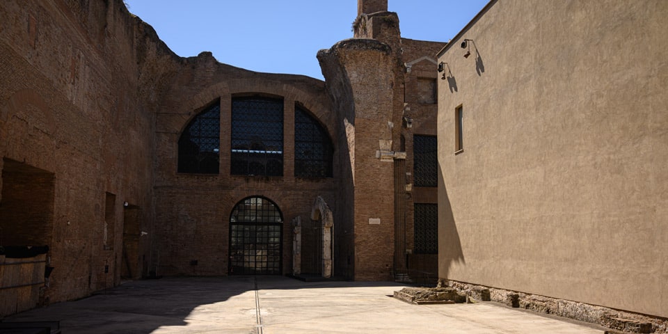 Massive ancient brick walls and thermal window of the Baths of Diocletian ruins, Rome Massive ancient brick walls and thermal window of the Baths of Diocletian ruins, Rome