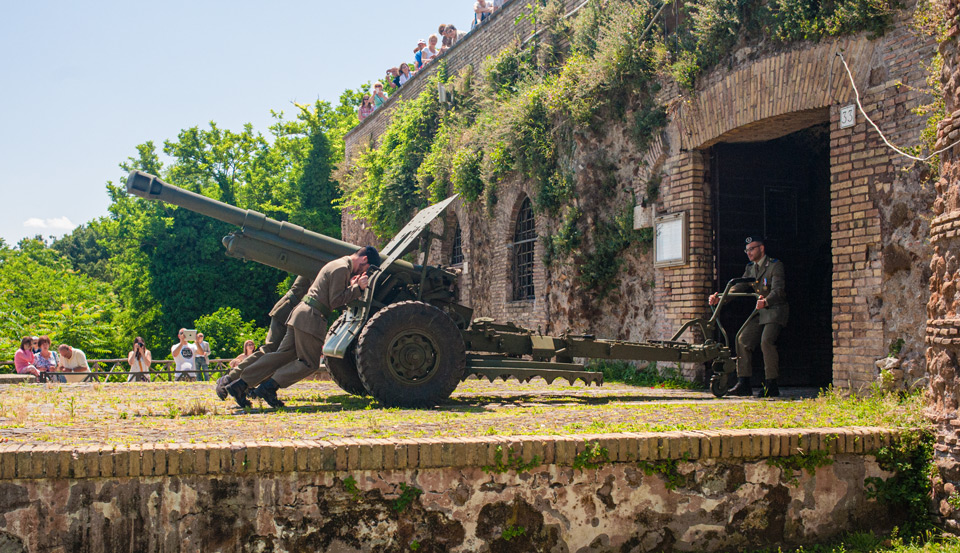 Italian Army soldiers returning the Janiculum noon cannon to its brick casemate after firing