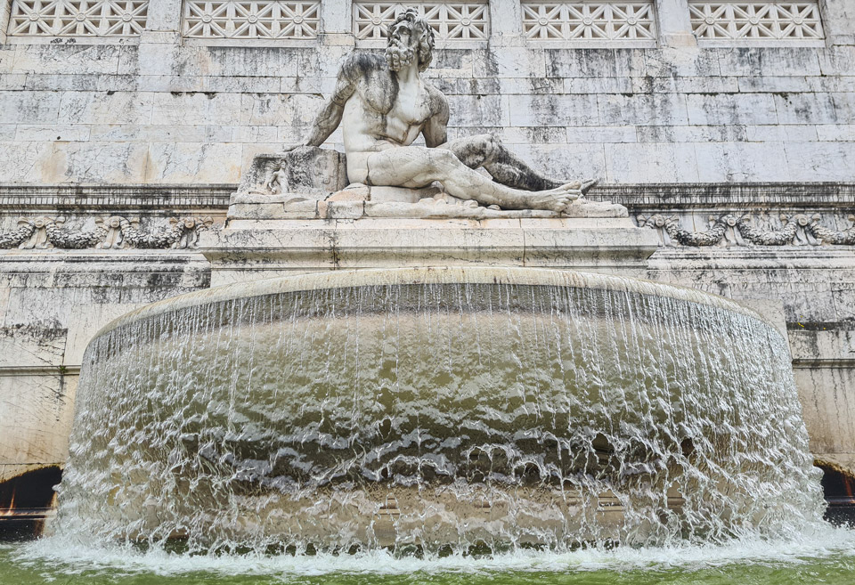 fountains at the base of the Altar of the Fatherland monument represent the seas bordering Italy