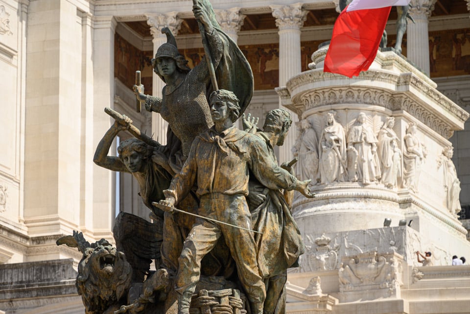 knight like figure in chainmail with a fierce lion at the group’s base Altar of The Fatherland Rome