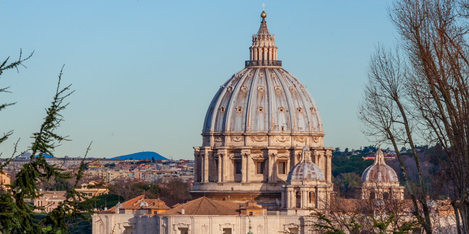 Close telephoto view of St Peter's dome from Piazzale Garibaldi