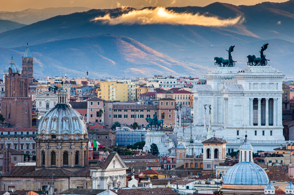 Vittoriano and its bronze quadrigae photographed at sunset from Piazzale Garibaldi