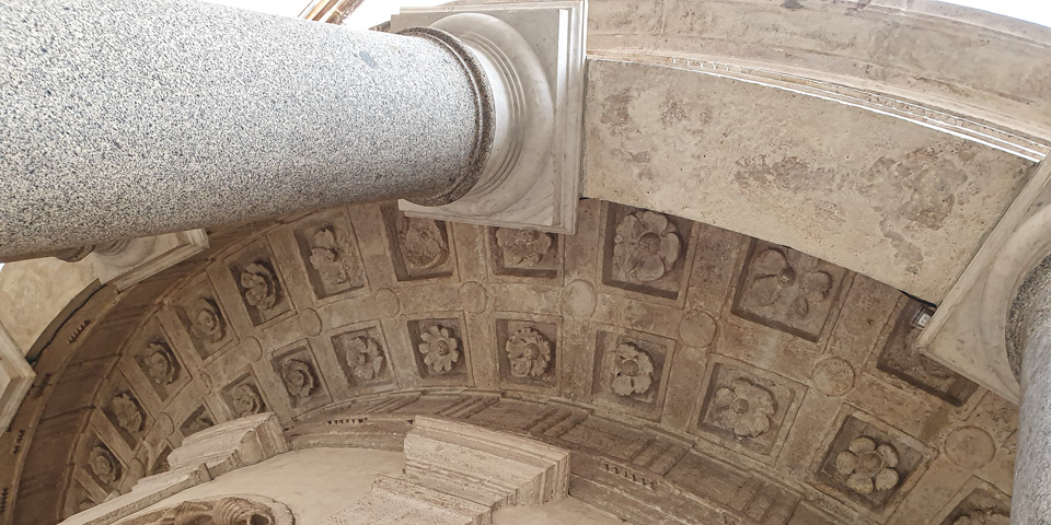 Coffered ceiling with carved rosettes beneath the circular portico of Bramante's Tempietto