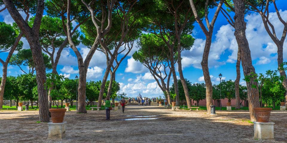 Visitors relaxing in the Orange Garden on the Aventine